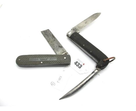 A Military Pocket Knife (Jack Knife), having one blade, Marlin spike and tin opener, in a chequered horn scaled body and lany