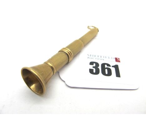 A 9ct Gold Cigar Piercer, engine turned decoration, 7.3cm long (excluding suspension loop) (overall weight 8.5grams). 