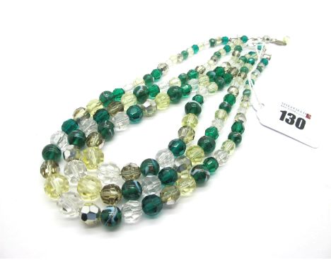 Christian Dior; A Vintage Three Row Bead Necklace, green and white, to elongated 'S' hook, the small oval panel stamped "Chri