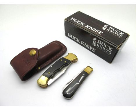 Sheffield England Single Blade Pocket Knife, with polished horn scales, brass bolster and linings, 9cm closed length; a Buck 