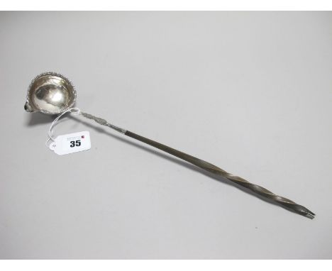 A Hallmarked Silver Toddy Ladle, (marks rubbed) the plain bowl with gadrooned border and side lip and twisted handle, overall