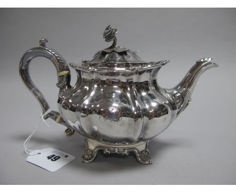 A Decorative Hallmarked Silver Bachelor's Tea Pot, Messrs Barnard, London 1833, of lobed design, with rose finial, raised on 