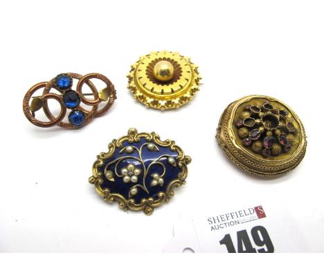 A XIX Century Locket Back Brooch, of shaped design, the flowerhead detail highlighted in pearls, on a blue enamel ground, wit