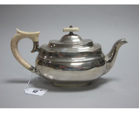 A Hallmarked Silver Tea Pot, EV, Sheffield 1939, of plain rounded rectangular form with shaped ivory handle and finial, 660gr