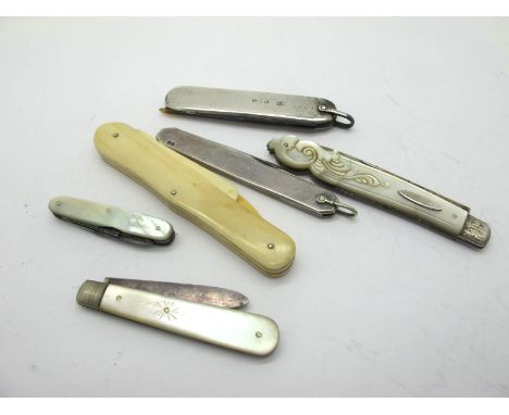 A Thos Turner Pocket Knife, two blades with silver scales, 8.5cm closed length; A Comb, in a silver scaled body with lanyard 