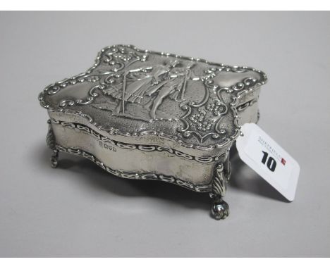 A Decorative Hallmarked Silver Trinket Box, Nathan &amp; Hayes, Chester 1906, the shaped hinged lid detailed in relief with c