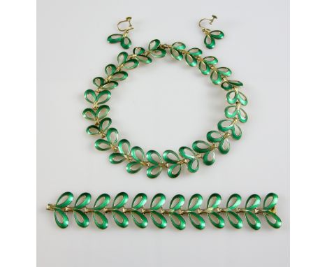 Norwegian enamel jewellery set by Albert Scharning, including looped green enamel necklace, bracelet and drop earrings with f