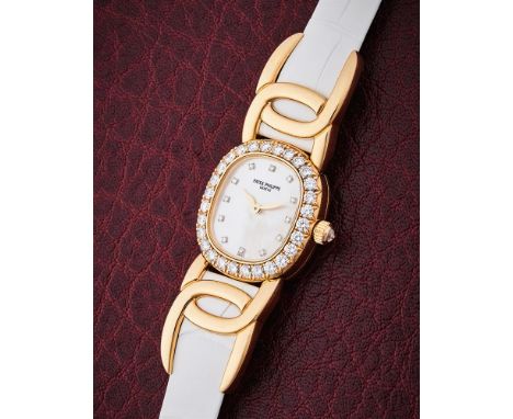 Y PATEK PHILIPPE, ELLIPSE, REF. 4931J-001 A LADY'S 18 CARAT GOLD AND DIAMOND WRISTWATCH, NO. 4056139, CIRCA 1999Movement: Cal