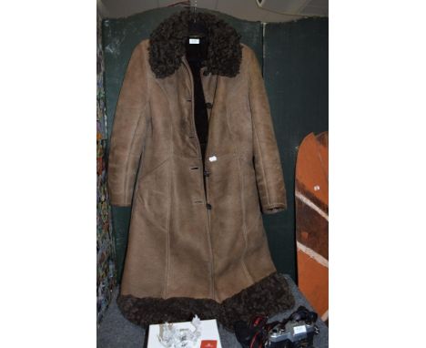 A vintage sheepskin coat, size label of 39.5.