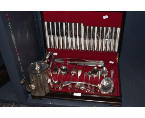 A partial canteen of Robert and Belk Ltd Furnival works, England stainless steel cutlery. Also included are a ladle and a tea