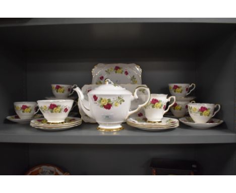 A Royal Stafford 'summer day' partial tea service having pink and yellow rose bud pattern, including tea pot, cups, saucers, 