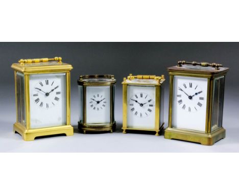 An early 20th Century French carriage timepiece, the white enamel dial with Roman numerals, to the eight day single train mov