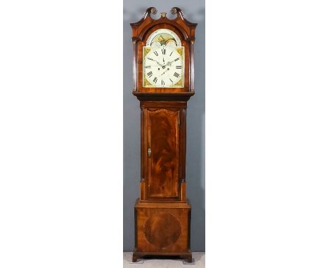 An early 19th Century mahogany longcase clock by J. Cottier of Peel, the 14ins arched painted dial with Roman numerals, subsi