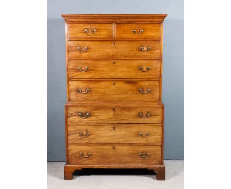 A George III mahogany tallboy, the upper part with moulded cornice, fitted two short and three long drawers, the base fitted 