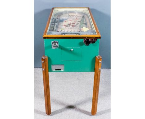 A 1950s American electrically powered "One-Shilling-in-the-Slot Turf Champs" pinball gaming machine by Stoner Manufacturing C