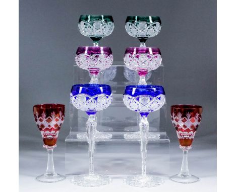 A suite of ten late 19th/early 20th Century colour-flashed hock glasses, the bowls, stems and bases deeply cut, 7.75ins high,