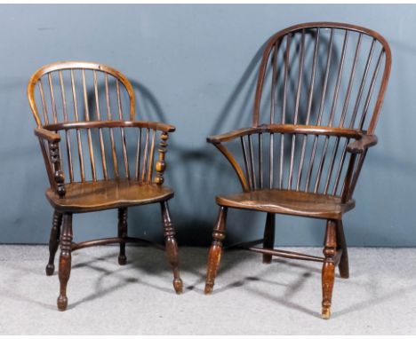 A 19th Century "Nottinghamshire" ash and elm seated stick back Windsor armchair with two tier stick back, on turned legs and 