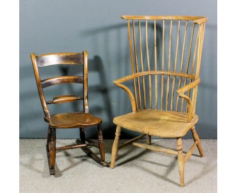 A 19th Century stripped ash and elm seated stick back Windsor armchair with curved two tier high back, on turned legs (reduce