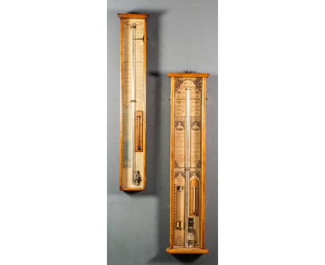 Two late Victorian oak cased "Admiral Fitzroy's" barometers with paper scales and in plain rectangular cases, 37ins and 36ins