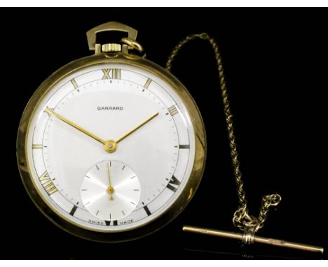 A 1980's gentleman's open faced pocket watch with Swiss movement retailed by Garrard of London, the champagne dial with Roman