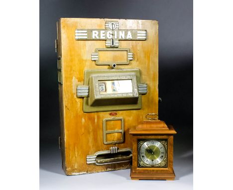 A 1950s Regina wooden and aluminum fronted wall mounted One Armed Bandit, 18ins wide x 5ins deep x 28ins high (in need of ful