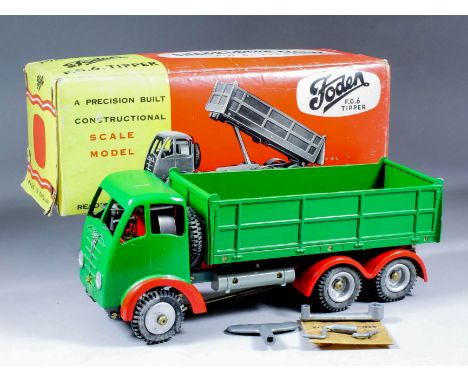 A Shackleton Toys tinplate clockwork model "Foden F.G.6 Tipper" painted in green, red, and grey, with key, spanner, maintenan