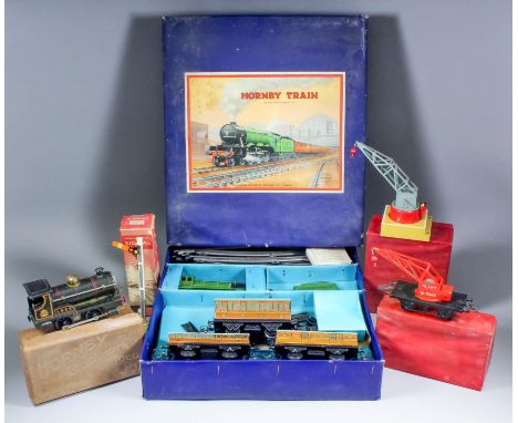 A collection of Hornby "O" gauge clockwork trains, comprising - No. 501 passenger set, in original box, the Hornby clockwork 