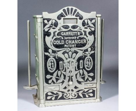 An early 20th Century Garrett's "Improved Gold Changer" (to take Sovereigns and Half Sovereigns), in nickel plated cast steel