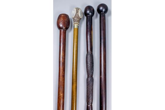 A 20th Century African Hardwood Walking Cane With Incised Chevron