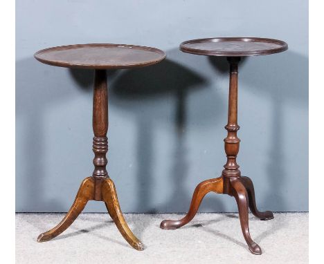 A mahogany circular tripod table of "18th Century" design, with moulded edge to top, on turned central column and cabriole le