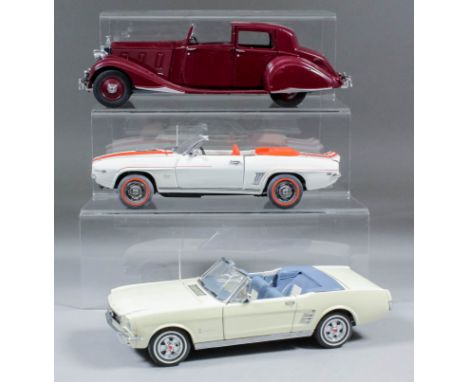 A collection of thirty-nine Danbury Mint diecast model cars, 1:24 scale, including a 1966 Ford Mustang, 1969 Chevrolet Camaro