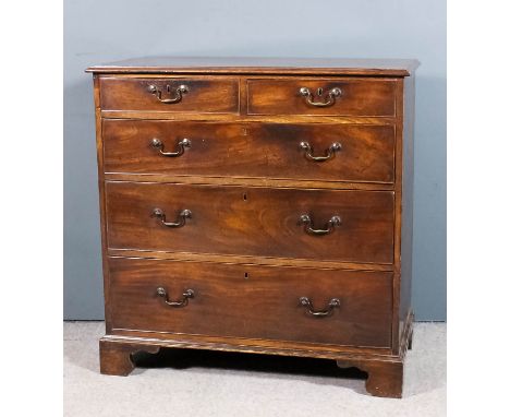 A George III mahogany chest with moulded edge to top, fitted two short and three long graduated drawers, with original brass 