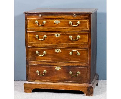 A George III mahogany chest later inlaid with chequered bandings and boxwood stringings, narrow moulded edge to top, fitted w