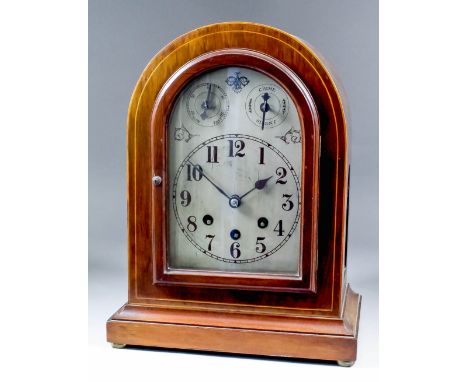 An early 20th Century German mahogany mantel clock, No. 5032, the silvered dial with Arabic numerals and chime/silent dial an