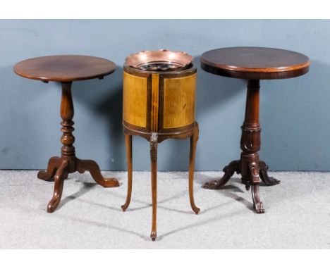 An early Victorian mahogany circular tripod occasional table with moulded edge to top, on heavy turned and moulded central co