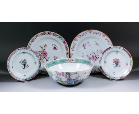 A Chinese Famille Verte porcelain bowl, the exterior enamelled with vases, flowering baskets, and stands, 9ins (22.8cm) diame