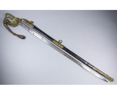 An 1897 pattern, Naval Officers' dress sword by Wilkinson of Pall Mall, London, the 31.5ins bright steel blade etched with cr