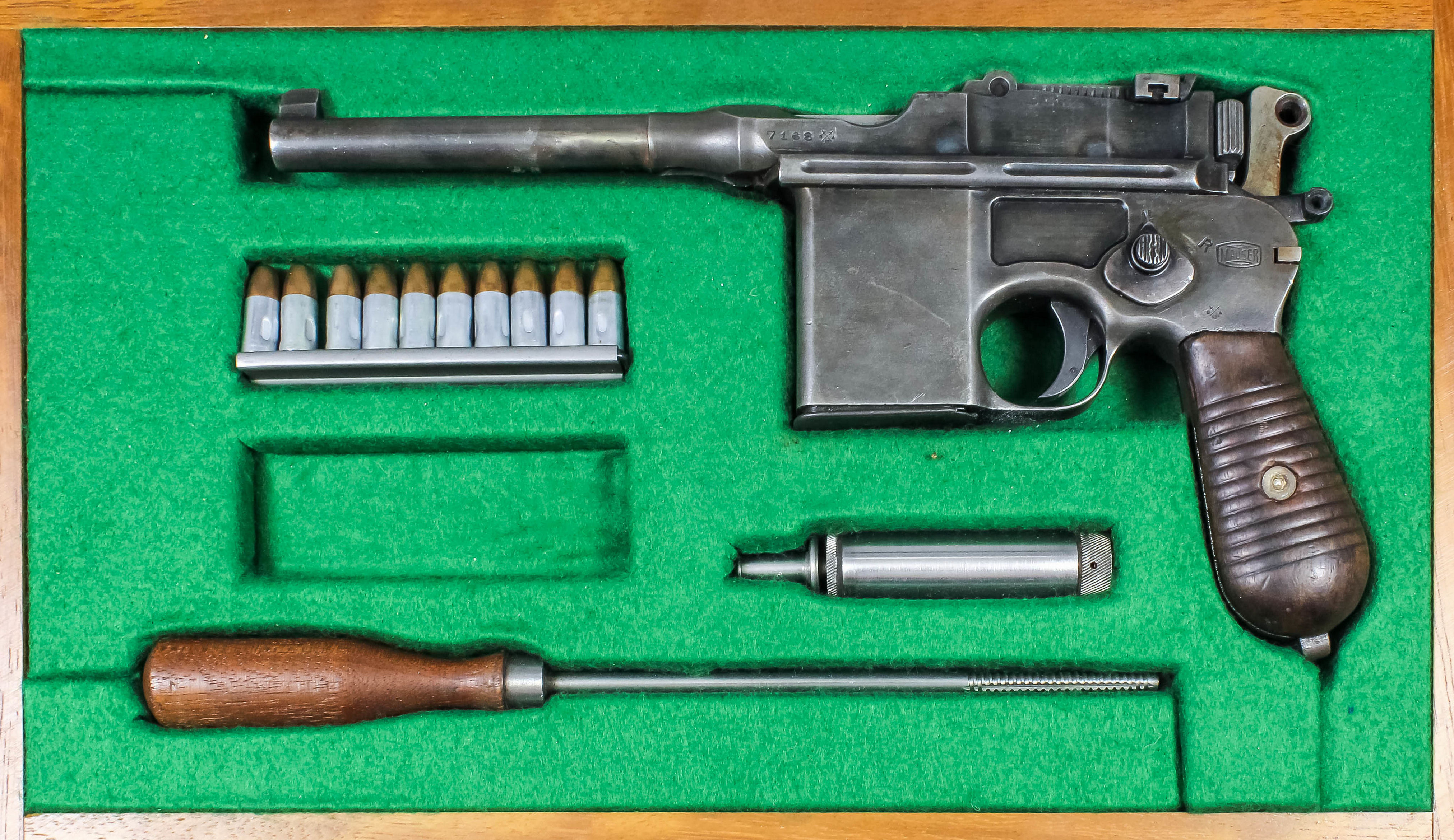 A deactivated Mauser 7.63mm calibre "broom handle" automatic pistol