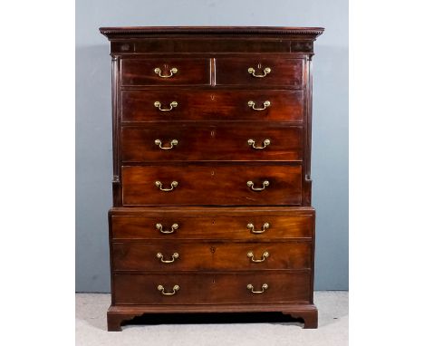 A George III mahogany tallboy, the upper part with dentil moulded cornice, fitted two short and three long drawers flanked by