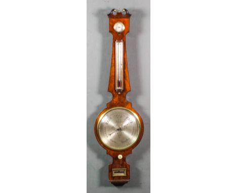 An early 19th Century figured mahogany cased wheel barometer, thermometer and hydrometer, by P. & P. Gally & Co, London, with