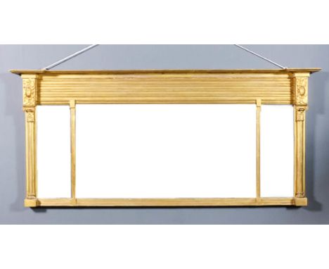 A 19th Century gilt framed overmantel mirror with moulded cornice, reeded frieze, turned, fluted and leaf capped cluster colu