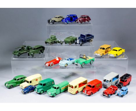 A collection of Dinky diecast model vehicles, including "N.C.B. electric van", painted in cream with "Express Dairy" decal, "