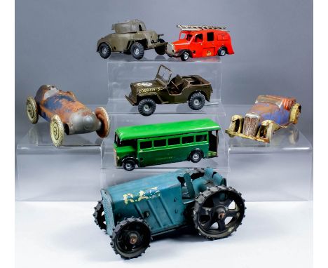 Seven clockwork tinplate models, including - Tri-ang tractor No. 2, in blue, Tri-ang "Minic" Toys Green Line coach in green, 