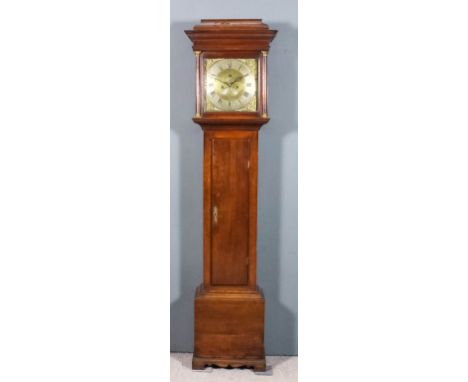 An 18th Century oak longcase clock by John Hargreave of Sleaford, the 12ins square brass dial with silvered chapter ring with