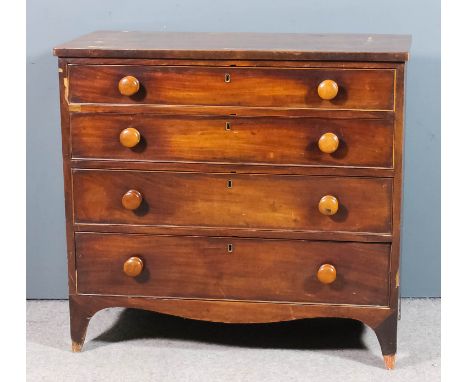 A Victorian mahogany chest with square edge to top, fitted four long graduated drawers, on shaped apron and bracket feet, 36i