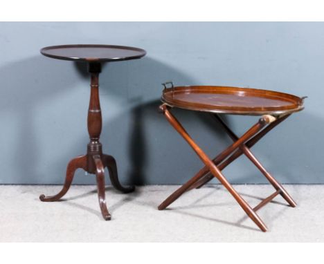 A mahogany circular tray top tripod table, on turned column and three moulded supports, 19.5ins diameter x 29.75ins high, and