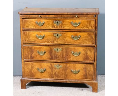 A George II bachelors figured walnut chest, the top and front inlaid with herringbone bandings and crossbanded, the top with 