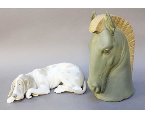 A Lladro Model of a Horses Head in Grecian Style, 25cm high, together with A Lladro Model of a Recumbent Blood Hound (2)From 