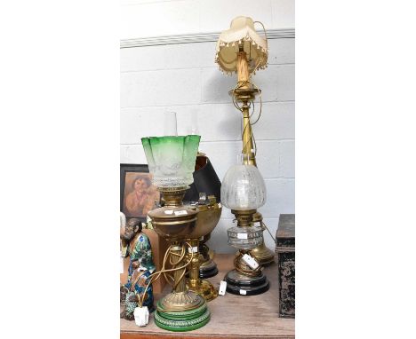Four Victorian Oil Lamps, including one of corinthian column form and three converted to electricity; together with A Brass-B