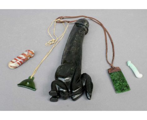 A Jade or Pounamu Hei Toki Pendant, possibly Maori, of adze form, 6.5cm, with knotted and braided necklace, a further greeen 